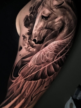Religious Animal Tattoo | Straight Lines Tattoo